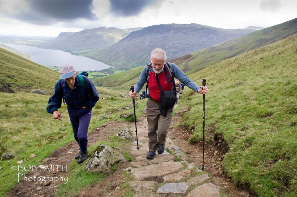 Sir Chris Bonington, right, and Joss Naylor ascend Scafell Pike.