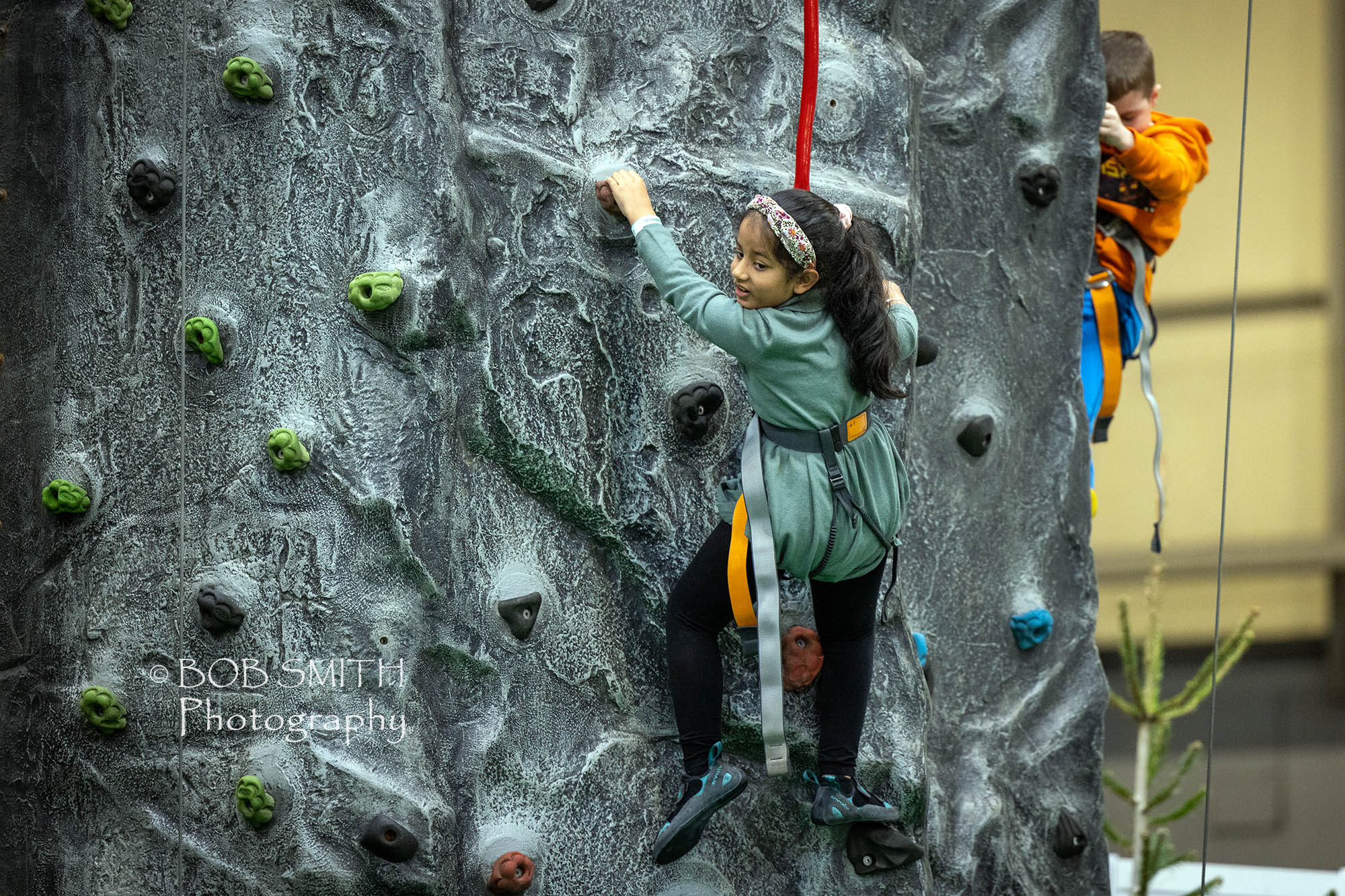 Youngsters emjoy the climbing wall at the National Outdoor Expo