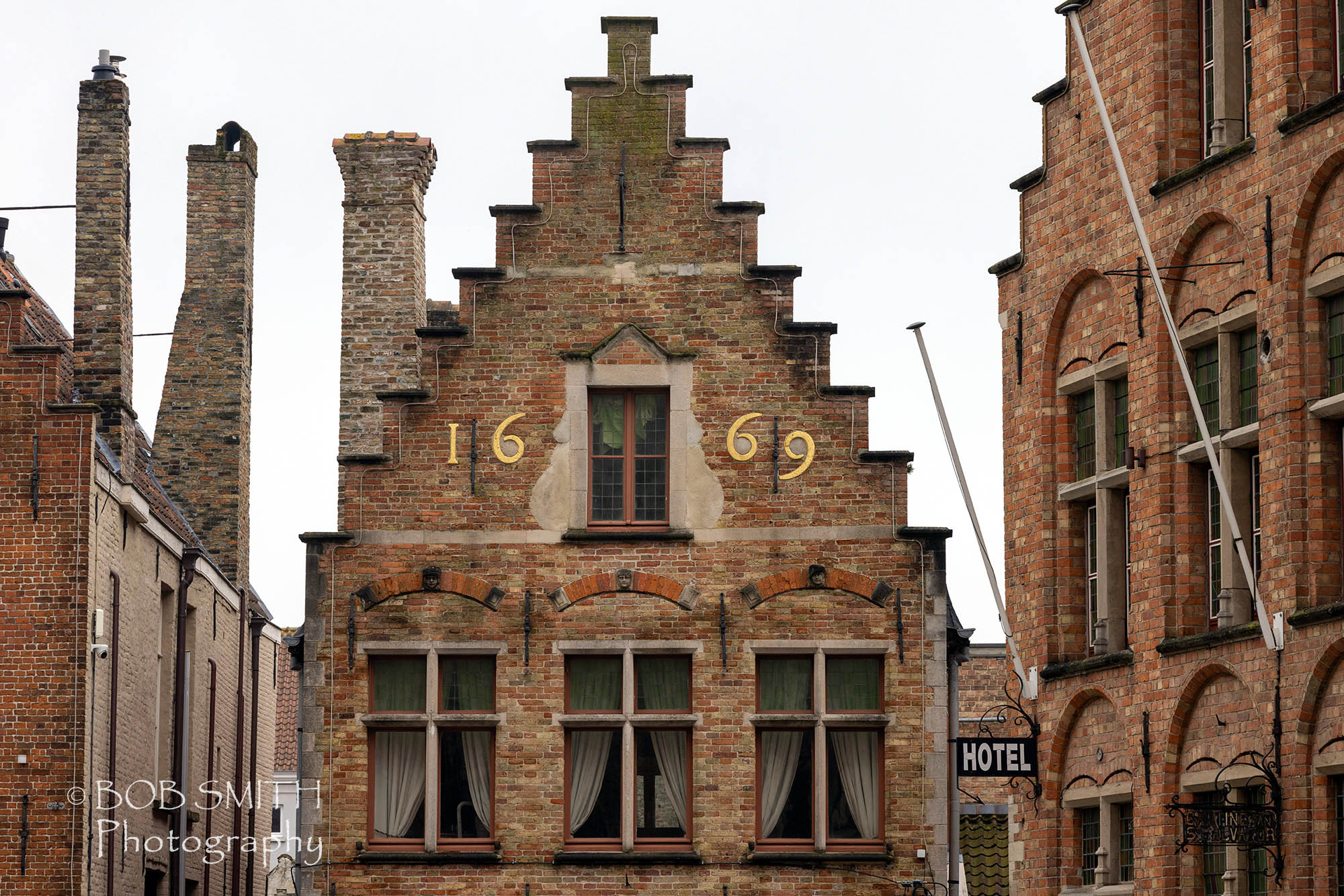 The distinctive crow-stepped gables of buildings in Bruges, Flanders, Belgium