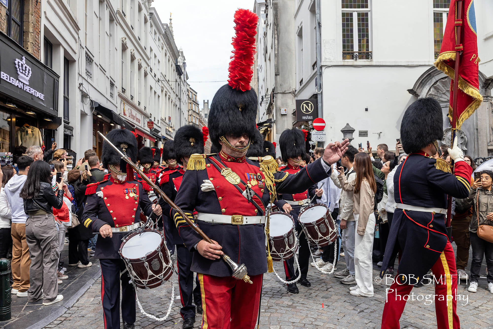 Members of la compagnie royale des Anciens Arquebusier de Visé, a traditional guild, parade to celebrate the clothing of the Brussels Manneken-Pis in their uniform as part of the association’s 450th anniversary