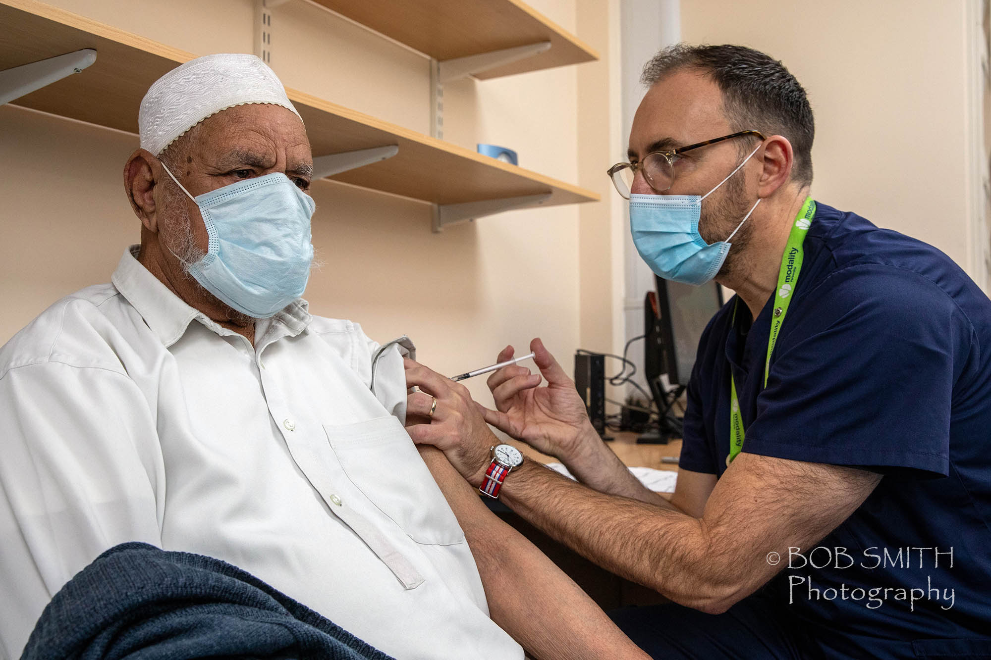 One of the first patients receives his Covid-19 vaccine at Long Lee Surgery, Keighley.