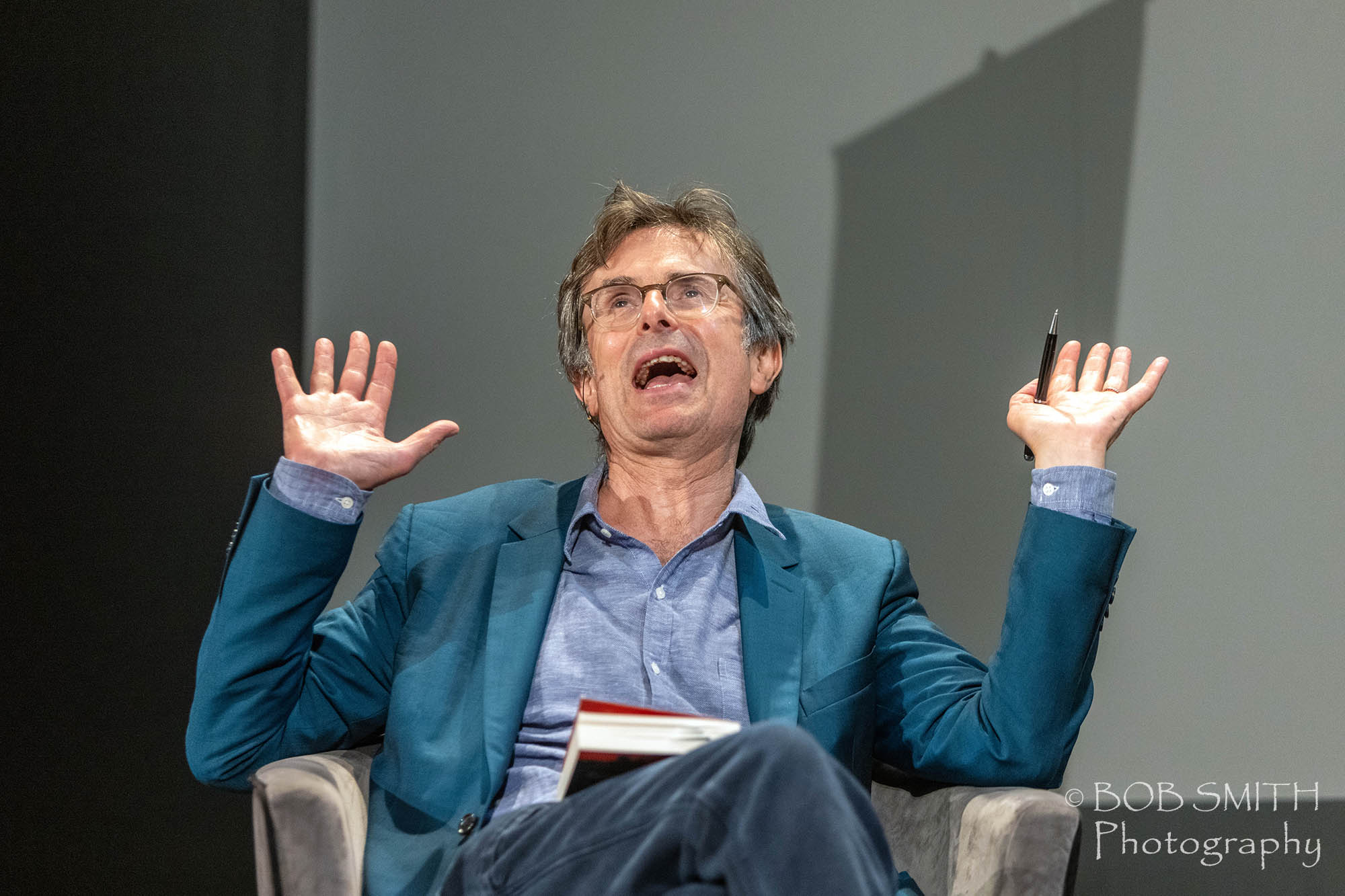 Broadcaster Robert Peston on stage during the Bradford Literature Festival