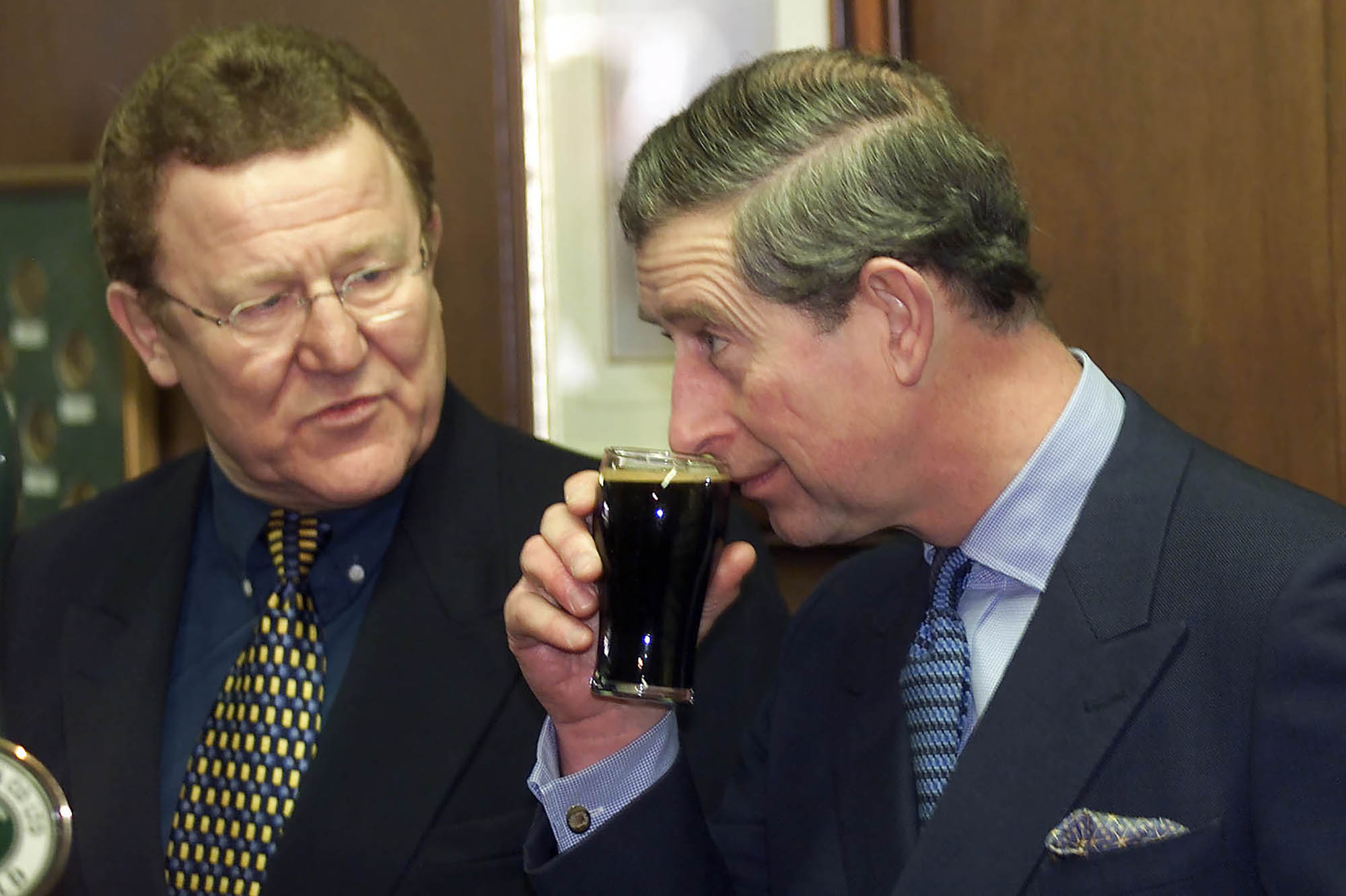 Winner by a nose: Prince Charles samples the beer at Timothy Taylor's brewery, watched by Ron Hawkins of the Woolly Sheep, Skipton.