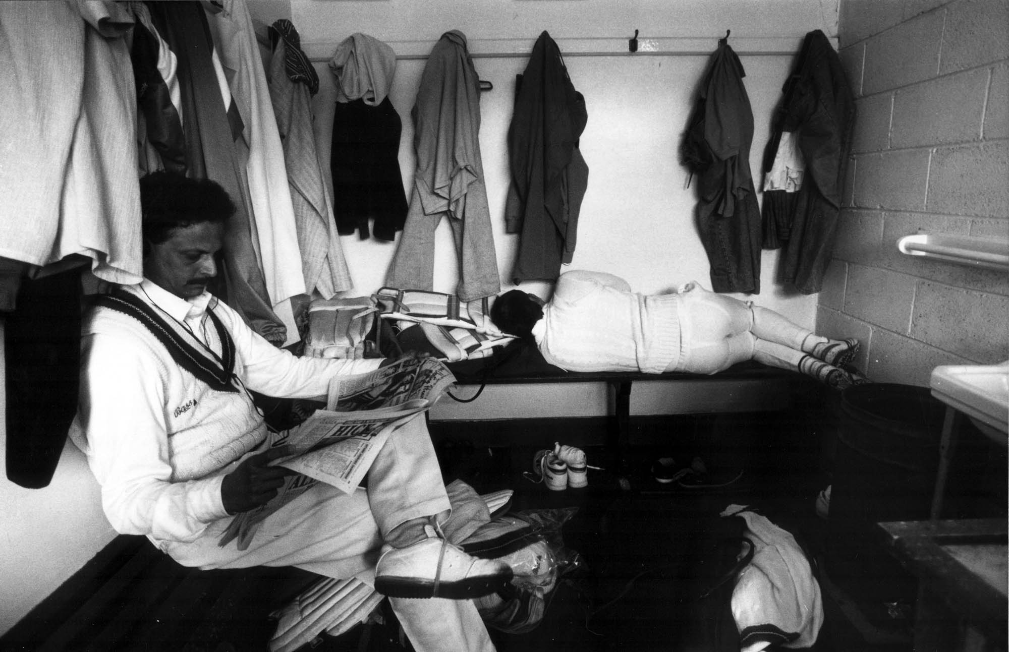 Cricket players take a break as rain stops play