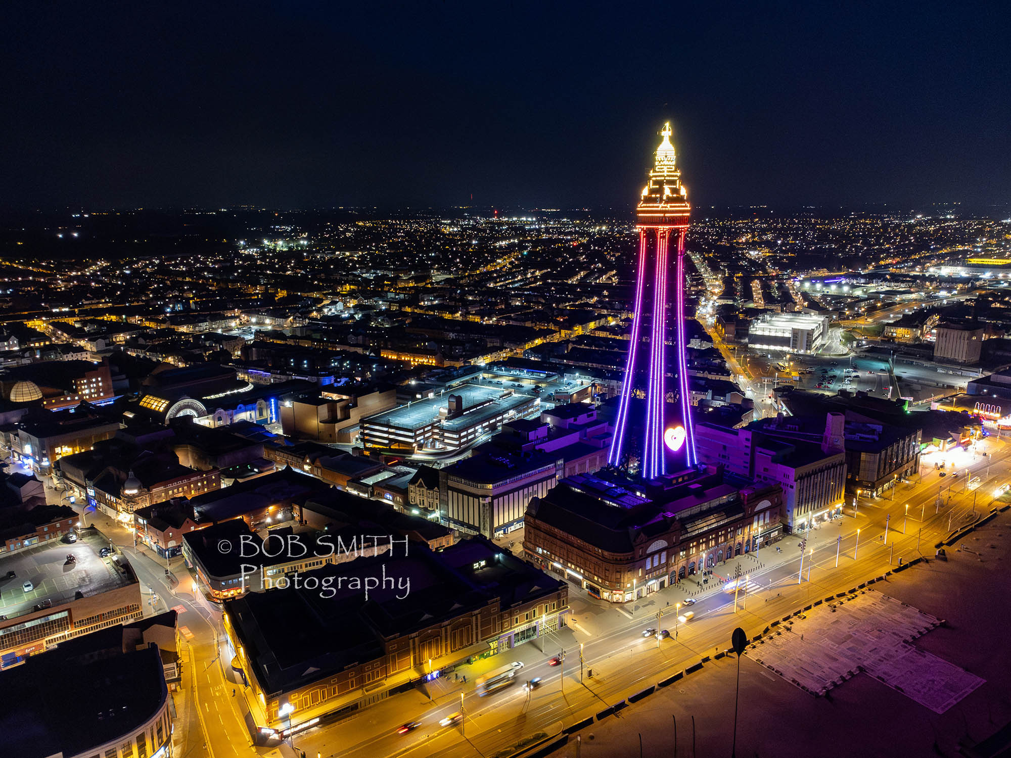 Night-time drone shot of Blackpool Tower