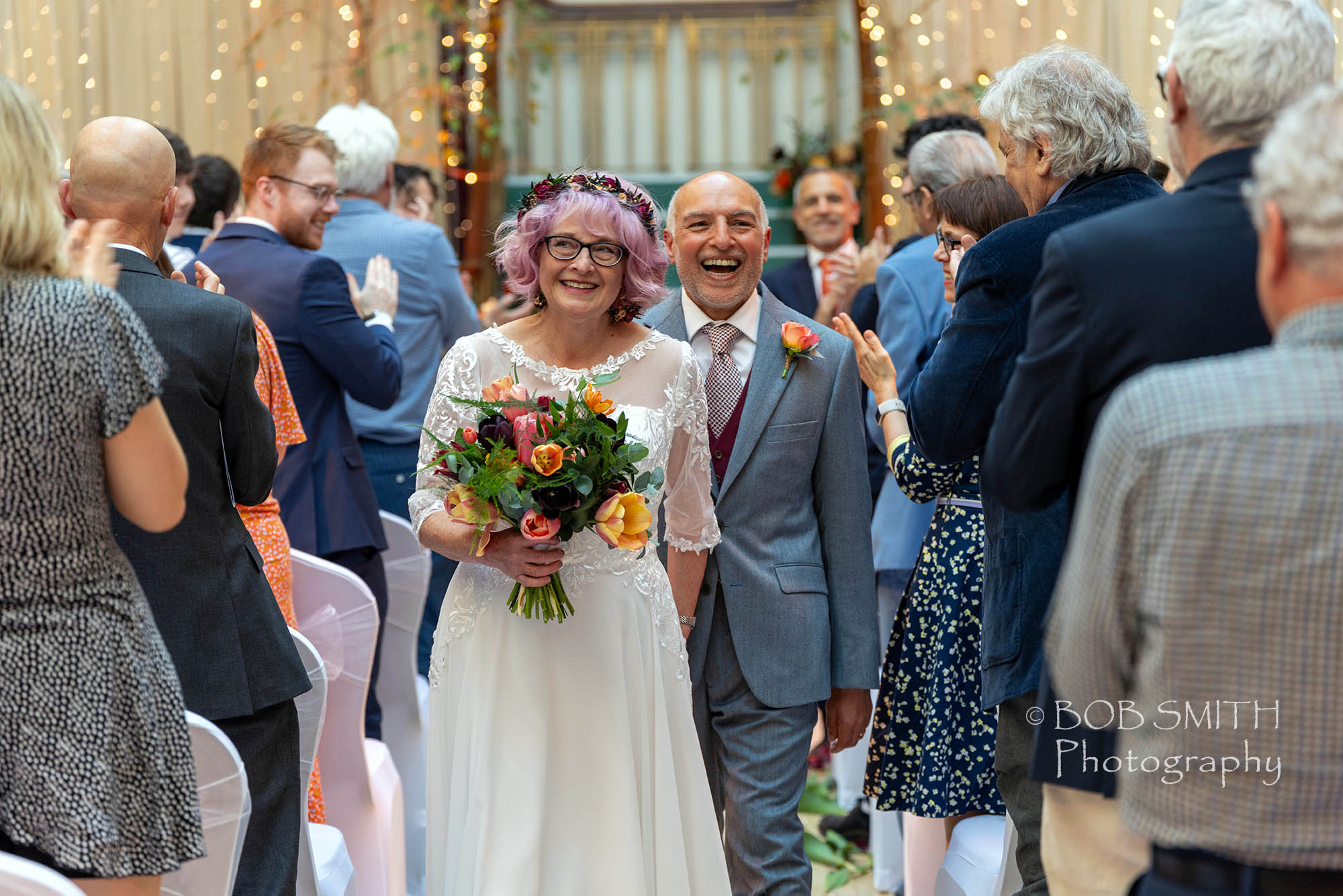 The newly-weds walk down the aisle 