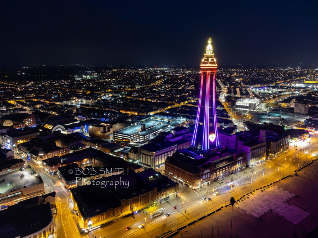 A drone shot of Blackpool Tower by night
