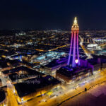 A drone shot of Blackpool Tower by night