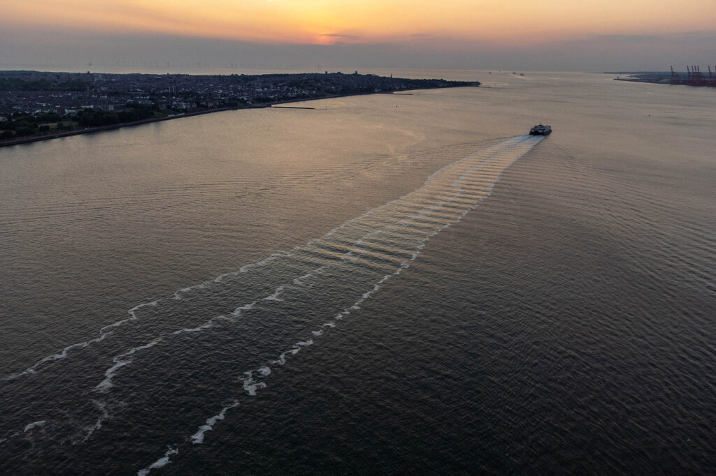 The Isle of Man ferry leaves Liverpool at sunset.