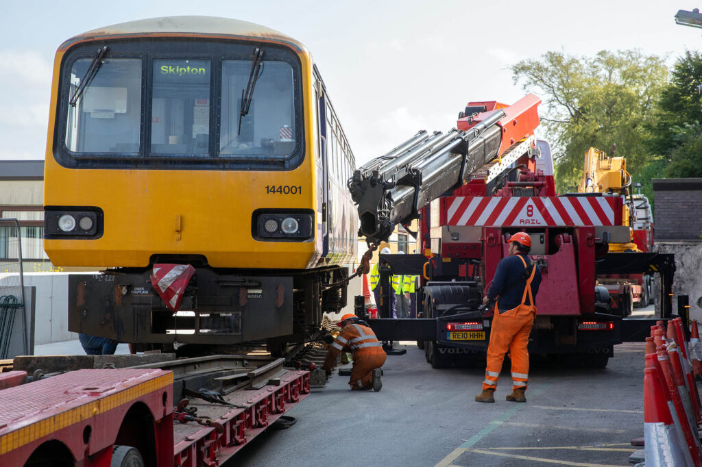 A disused train is delivered to Airedale Hospital